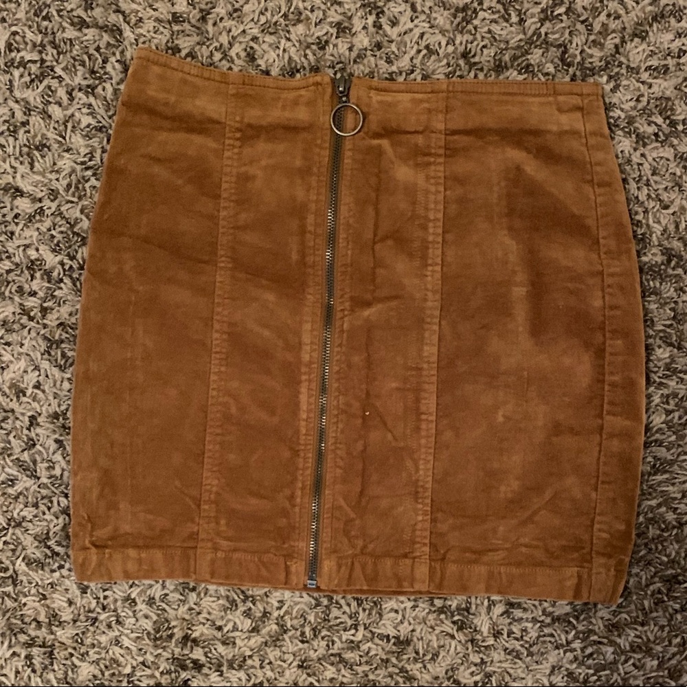 Suede zip up skirt.